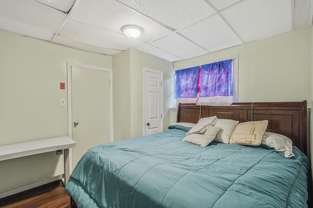 248 44th St, Lindenhurst, NY 11757 - bedroom featuring a drop ceiling and dark wood-style flooring