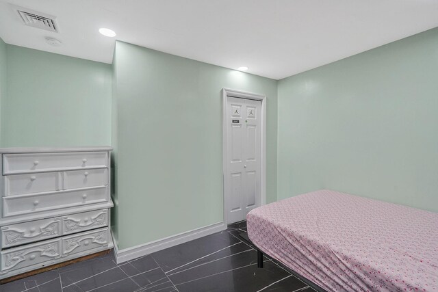 248 44th St, Lindenhurst, NY 11757 - bedroom with baseboards and recessed lighting