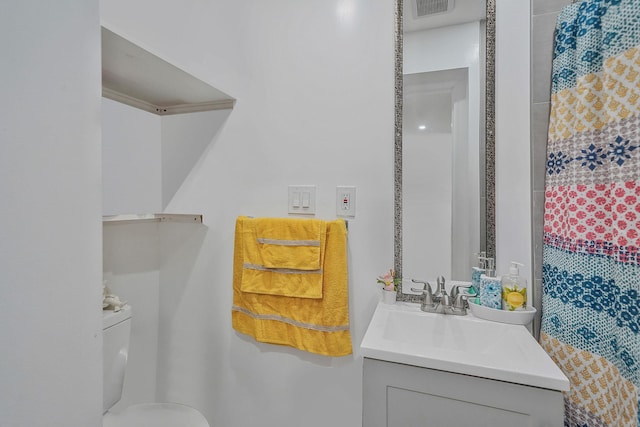 248 44th St, Lindenhurst, NY 11757 - bathroom with vanity and toilet