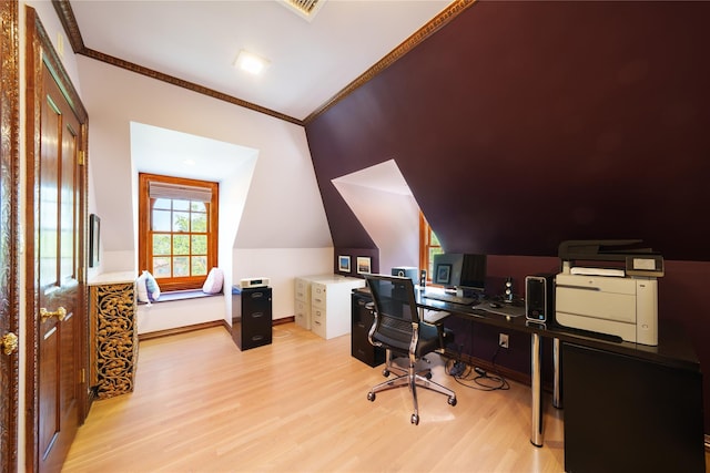 office with light wood-style flooring, crown molding, vaulted ceiling, and baseboards
