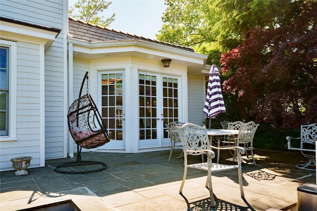 view of patio / terrace with french doors and outdoor dining area