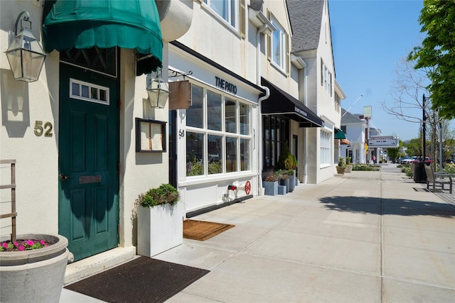 52 Main St Unit 6, Westhampton Beach, NY 11978 - entrance to property featuring stucco siding