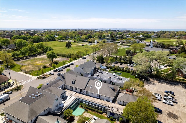 52 Main St Unit 6, Westhampton Beach, NY 11978 - aerial perspective of suburban area with a tree filled landscape