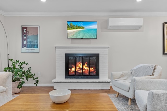 112 Edgehill Dr, Wappingers Falls, NY 12590 - sitting room featuring an AC wall unit, wood finished floors, baseboards, recessed lighting, and crown molding