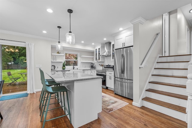 112 Edgehill Dr, Wappingers Falls, NY 12590 - kitchen with appliances with stainless steel finishes, wall chimney range hood, open shelves, white cabinets, and light stone counters