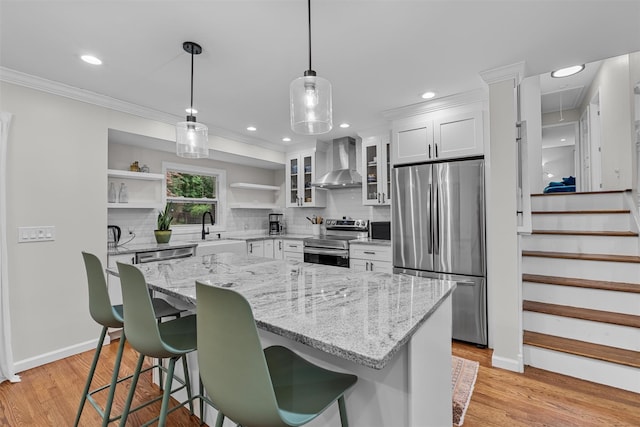 112 Edgehill Dr, Wappingers Falls, NY 12590 - kitchen with appliances with stainless steel finishes, wall chimney range hood, open shelves, a sink, and backsplash