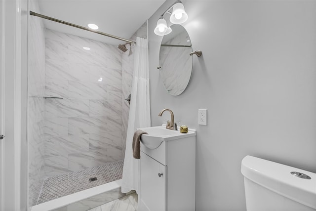 112 Edgehill Dr, Wappingers Falls, NY 12590 - full bath featuring marble look tiles, vanity, toilet, and a tile shower