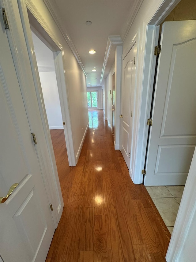 42-23 212th St Unit 3C, Bayside, NY 11361 - hall featuring ornamental molding, wood finished floors, recessed lighting, and baseboards