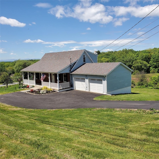 111 Cream St, Poughkeepsie, NY 12601 - view of front of property featuring a porch, an attached garage, a front lawn, asphalt driveway, and a shingled roof