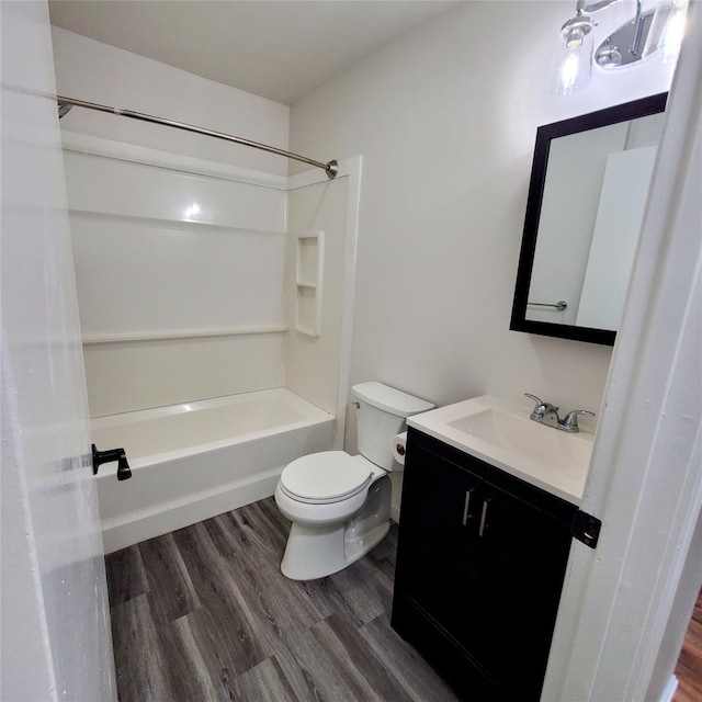 111 Cream St, Poughkeepsie, NY 12601 - bathroom with vanity, tub / shower combination, toilet, and wood finished floors