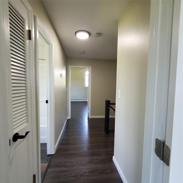 111 Cream St, Poughkeepsie, NY 12601 - hallway with an upstairs landing, dark wood-style flooring, and baseboards