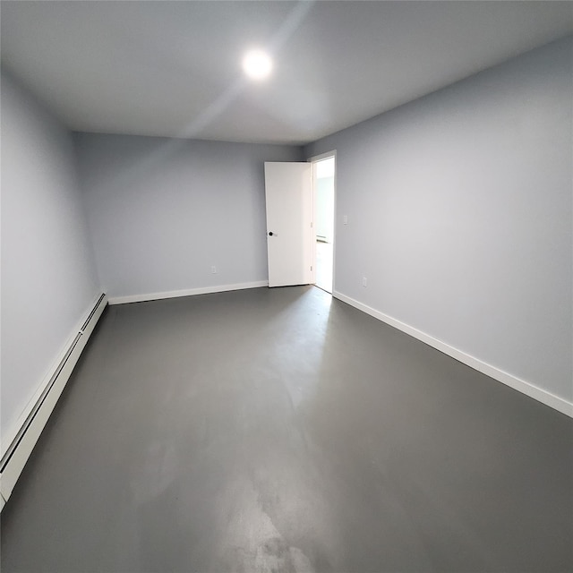 111 Cream St, Poughkeepsie, NY 12601 - empty room featuring baseboard heating, finished concrete flooring, and baseboards