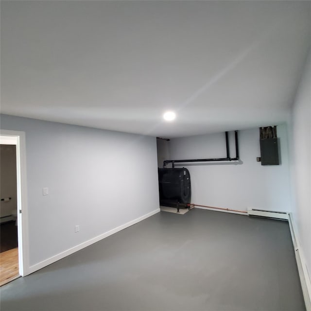 111 Cream St, Poughkeepsie, NY 12601 - finished below grade area with oil tank, a baseboard heating unit, baseboards, electric panel, and recessed lighting