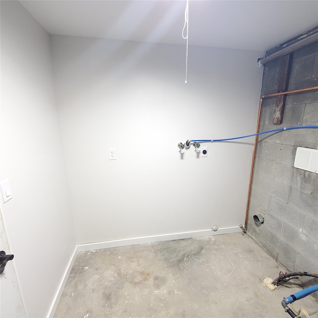 111 Cream St, Poughkeepsie, NY 12601 - bathroom with concrete floors, baseboards, and concrete block wall