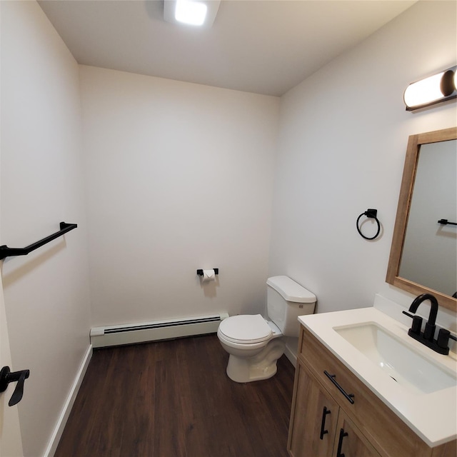 111 Cream St, Poughkeepsie, NY 12601 - bathroom with a baseboard radiator, toilet, wood finished floors, and vanity