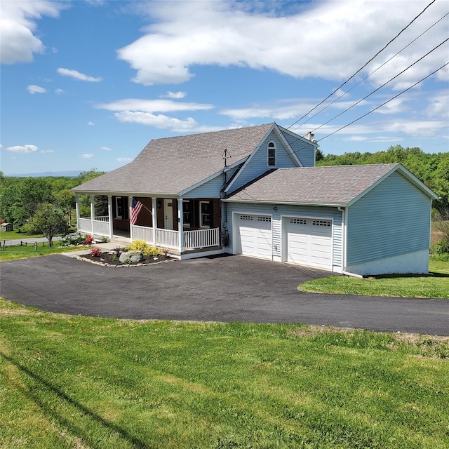 111 Cream St, Poughkeepsie, NY 12601 - view of front of property with covered porch, a garage, roof with shingles, driveway, and a front yard