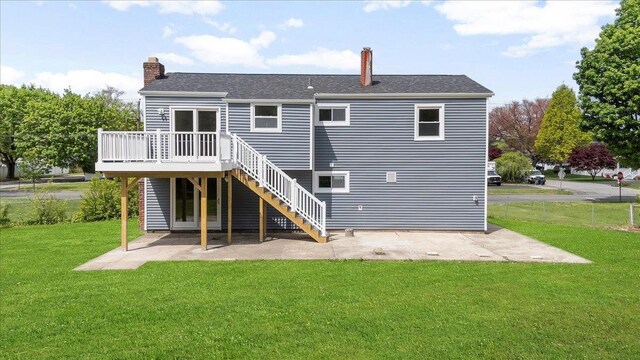 8 April Ave, Dix Hills, NY 11746 - rear view of property with a chimney, a wooden deck, stairs, and a patio