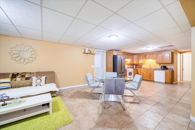 236 Budd Rd, Wurtsboro, NY 12788 - dining room featuring baseboards, a paneled ceiling, and light tile patterned floors