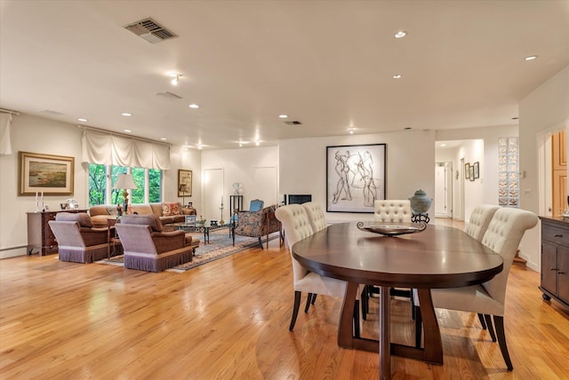 1314 Everit Pl, Hewlett Harbor, NY 11557 - dining area with light wood finished floors and recessed lighting