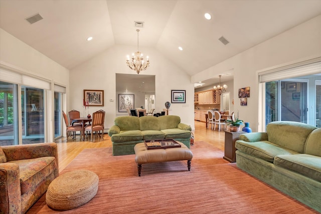 1314 Everit Pl, Hewlett Harbor, NY 11557 - living area featuring a chandelier, high vaulted ceiling, light wood finished floors, and recessed lighting