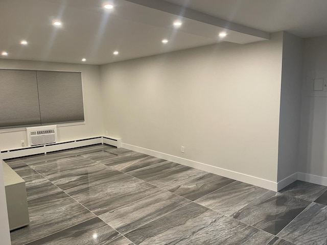 empty room featuring recessed lighting, baseboards, a baseboard radiator, and a wall mounted AC