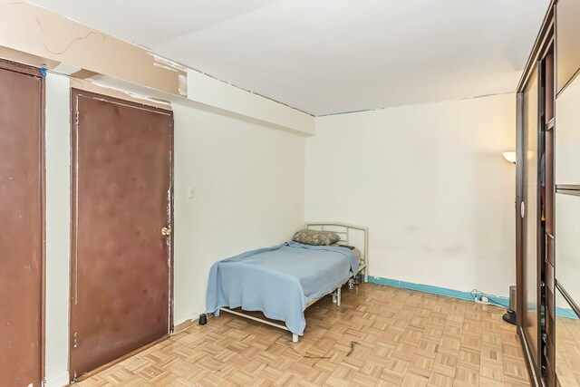35-20 Leverich St Unit B 227, Jackson Heights, NY 11372 - bedroom featuring baseboards