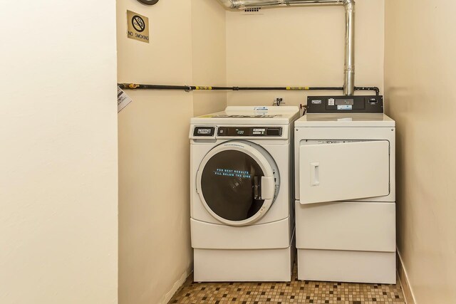 35-20 Leverich St Unit B 227, Jackson Heights, NY 11372 - laundry room featuring washer and dryer and baseboards