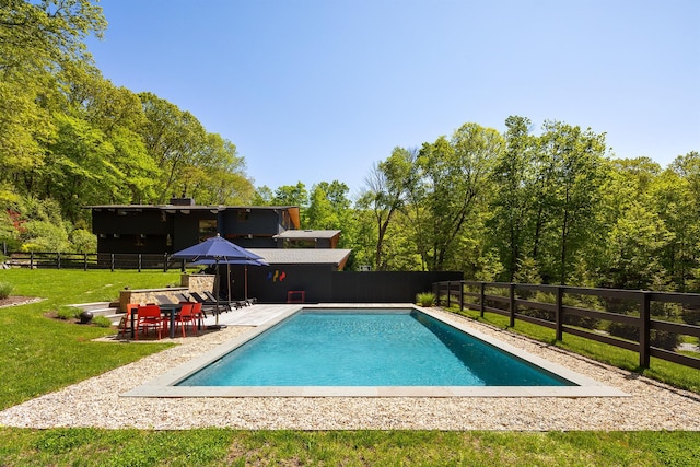 view of pool featuring a patio