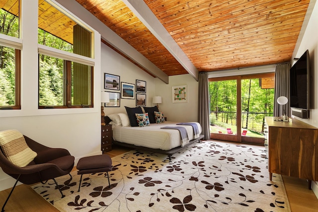bedroom with wood ceiling, access to outside, and wood finished floors