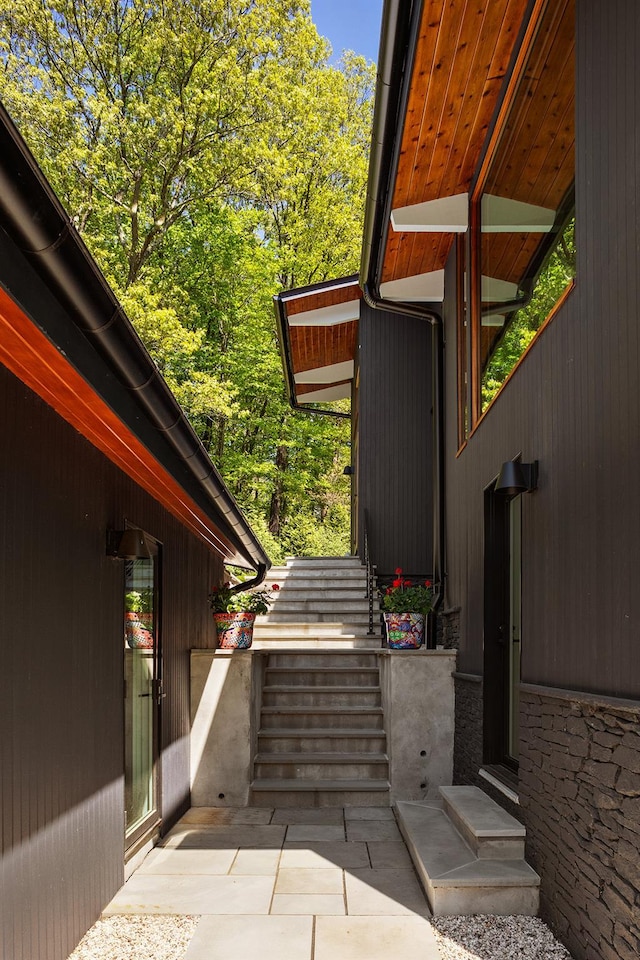 view of home's exterior with stairs
