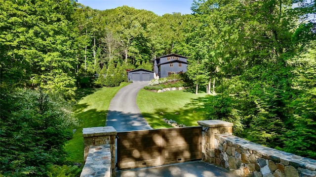 21 Black Spring Rd, Pound Ridge, NY 10576 - view of front facade featuring a forest view