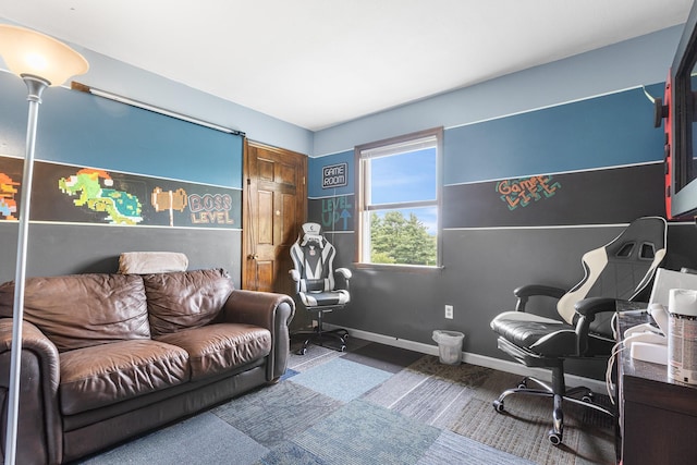 office space with baseboards