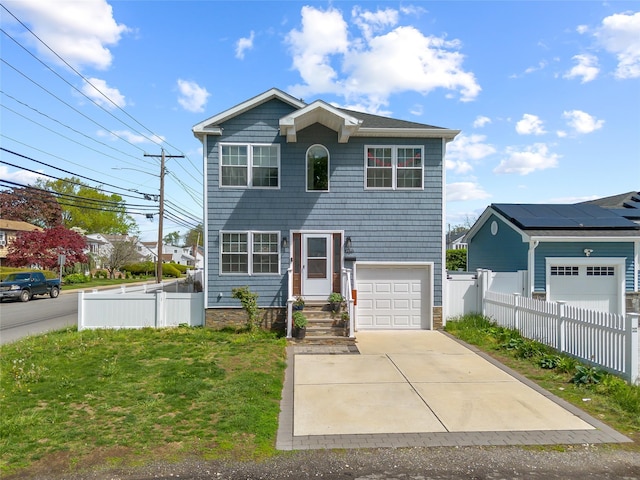 3875 S St, Seaford, NY 11783 - view of front facade featuring a garage and driveway