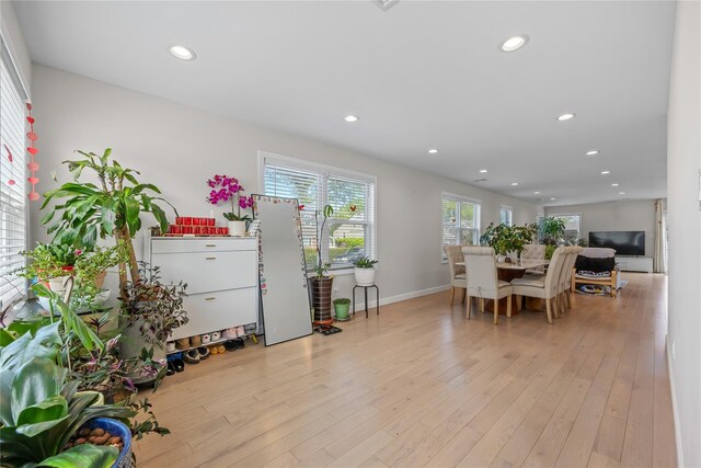 3875 S St, Seaford, NY 11783 - dining area featuring recessed lighting, light wood-type flooring, and baseboards
