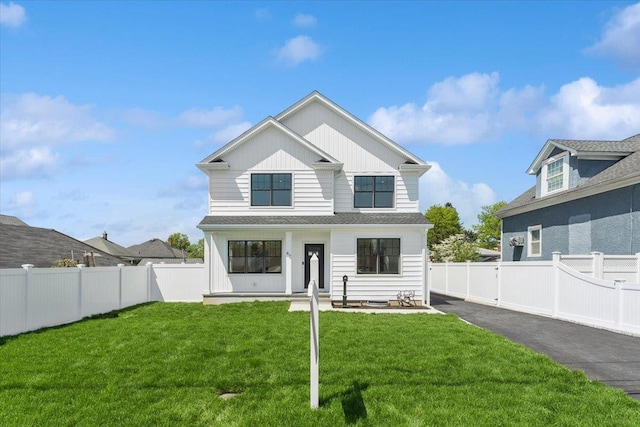 42 Second St, Extension, Glen Cove, NY 11542 - view of front of house with board and batten siding