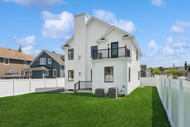 42 Second St, Extension, Glen Cove, NY 11542 - rear view of house featuring central AC unit, a chimney, and a balcony