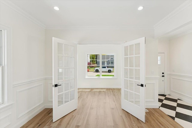 42 Second St, Extension, Glen Cove, NY 11542 - interior space with french doors, a decorative wall, a wainscoted wall, ornamental molding, and recessed lighting
