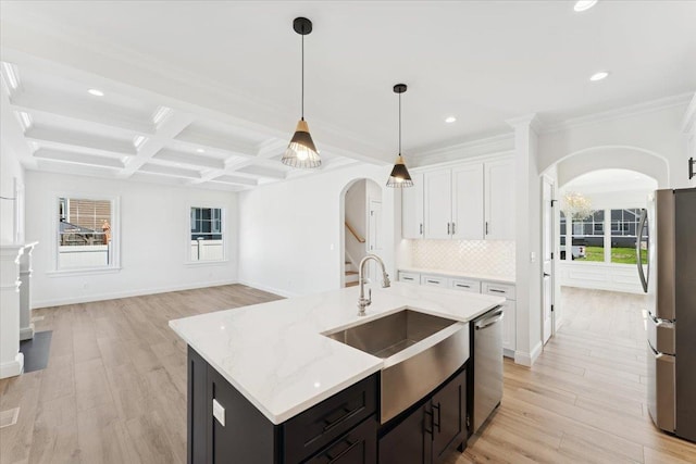 42 Second St, Extension, Glen Cove, NY 11542 - kitchen featuring arched walkways, stainless steel appliances, a sink, decorative backsplash, and recessed lighting