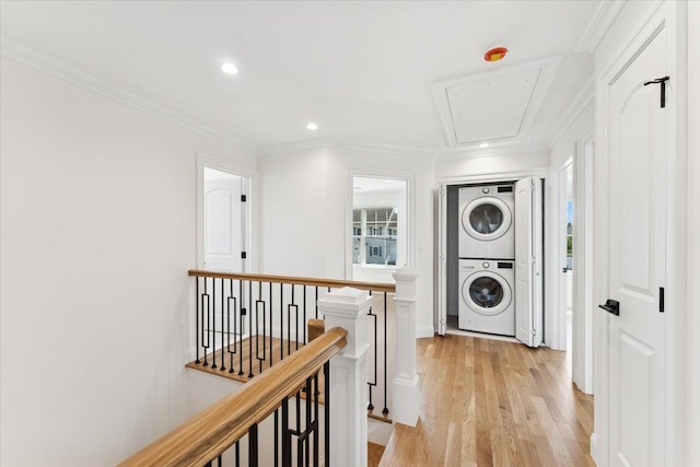42 Second St, Extension, Glen Cove, NY 11542 - hall with stacked washer / dryer, attic access, an upstairs landing, light wood-type flooring, and recessed lighting