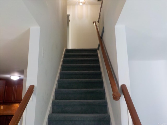 808 Woodland Ct, Coram, NY 11727 - stairway featuring baseboards