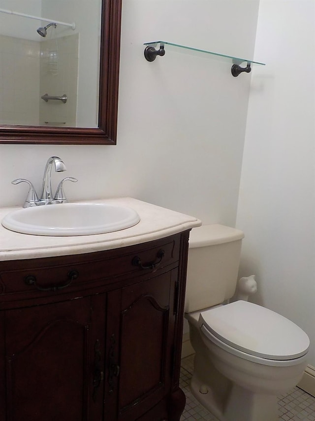 808 Woodland Ct, Coram, NY 11727 - bathroom featuring tile patterned flooring, vanity, toilet, and a shower