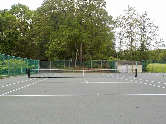 808 Woodland Ct, Coram, NY 11727 - view of tennis court with fence