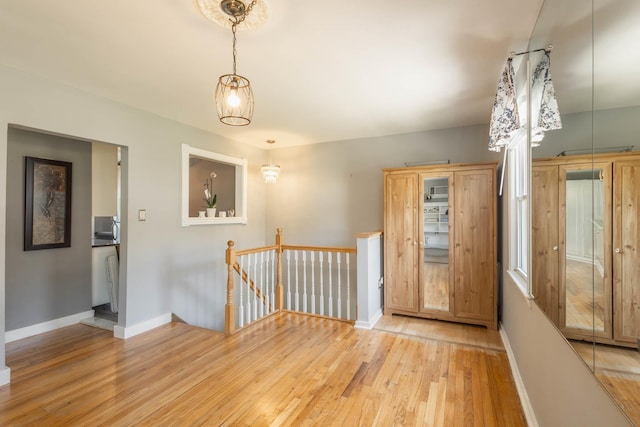 251-12 71st Rd Unit 29B, Bellerose, NY 11426 - entrance foyer with light wood-style flooring and baseboards