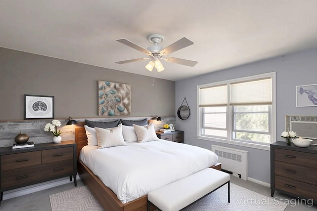 251-12 71st Rd Unit 29B, Bellerose, NY 11426 - bedroom with radiator, light carpet, a ceiling fan, and baseboards