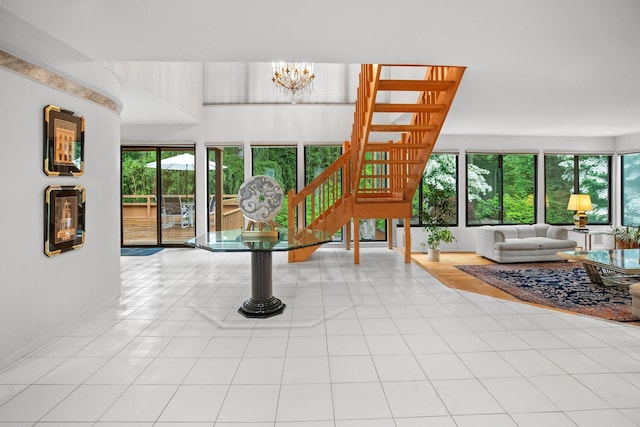 5 Ponds Ln, Purchase, NY 10577 - unfurnished living room with a chandelier and tile patterned floors