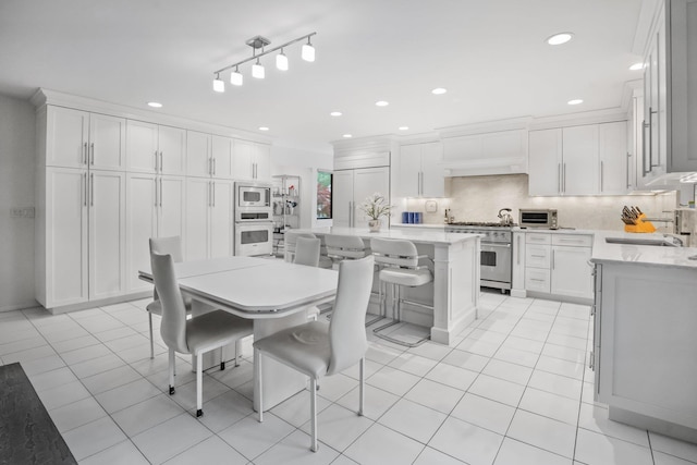 5 Ponds Ln, Purchase, NY 10577 - dining space featuring light tile patterned flooring and recessed lighting