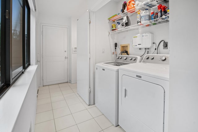 5 Ponds Ln, Purchase, NY 10577 - washroom featuring washing machine and clothes dryer and light tile patterned flooring