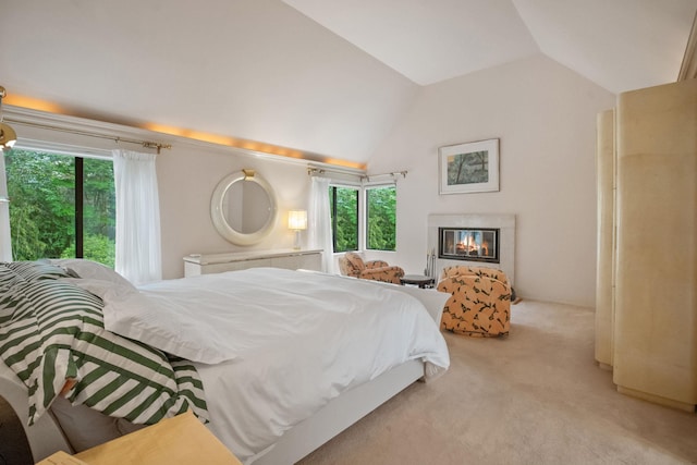 5 Ponds Ln, Purchase, NY 10577 - carpeted bedroom with lofted ceiling and a glass covered fireplace