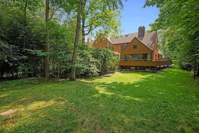 5 Ponds Ln, Purchase, NY 10577 - view of grassy yard with a wooden deck
