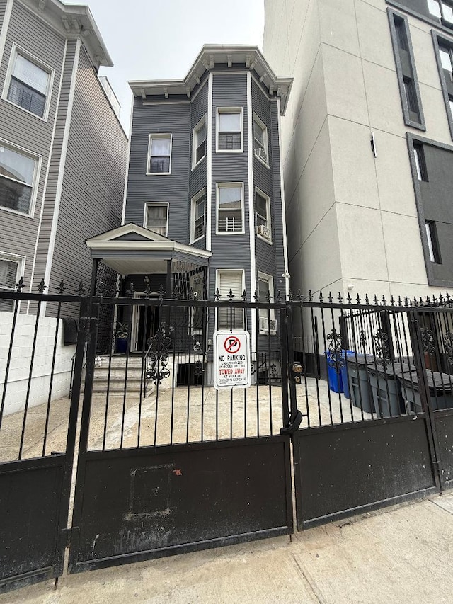 1956 Anthony Ave, Bronx, NY 10457 - gate featuring a fenced front yard